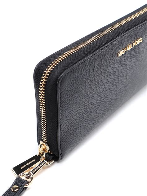 michael kors jet set travel continental wallet cement|Michael Kors continental wristlet.